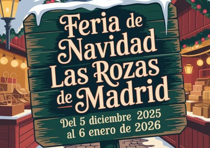 Primer plano de un cartel de madera verde con nieve en la parte superior, anunciando la "Feria de Navidad Las Rozas de Madrid. Del 5 diciembre 2025 al 6 enero de 2026".